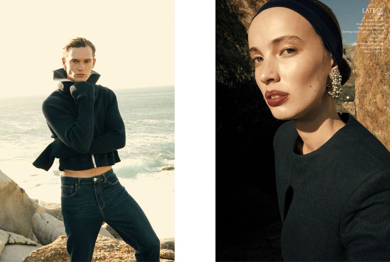 Fashion editorial shot featuring a blonde male model on a rocky coast and a brunette female model wearing statement earrings.