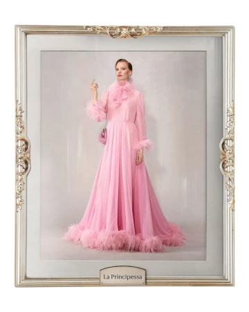 Elegant woman in a feathered pink gown, posing in a framed photograph, wearing a feathered collar and holding a pink purse.