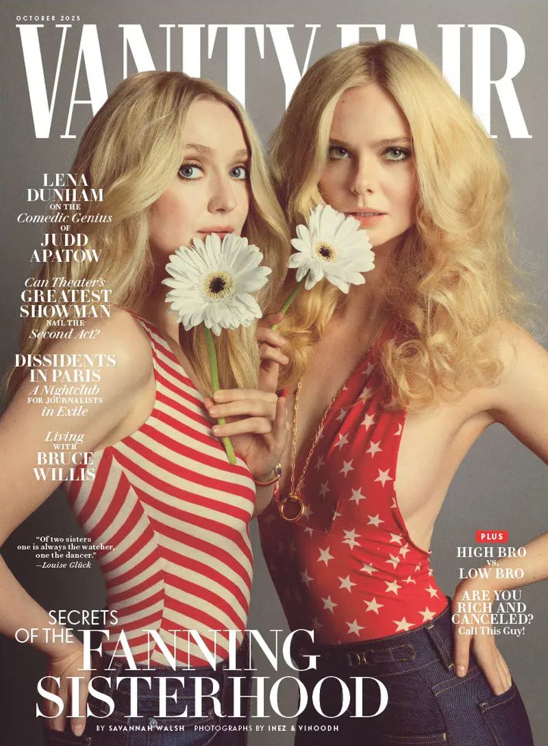 Vanity Fair cover featuring Dakota and Elle Fanning, with a close-up of the actresses holding daisies, wearing red, white, and blue outfits.