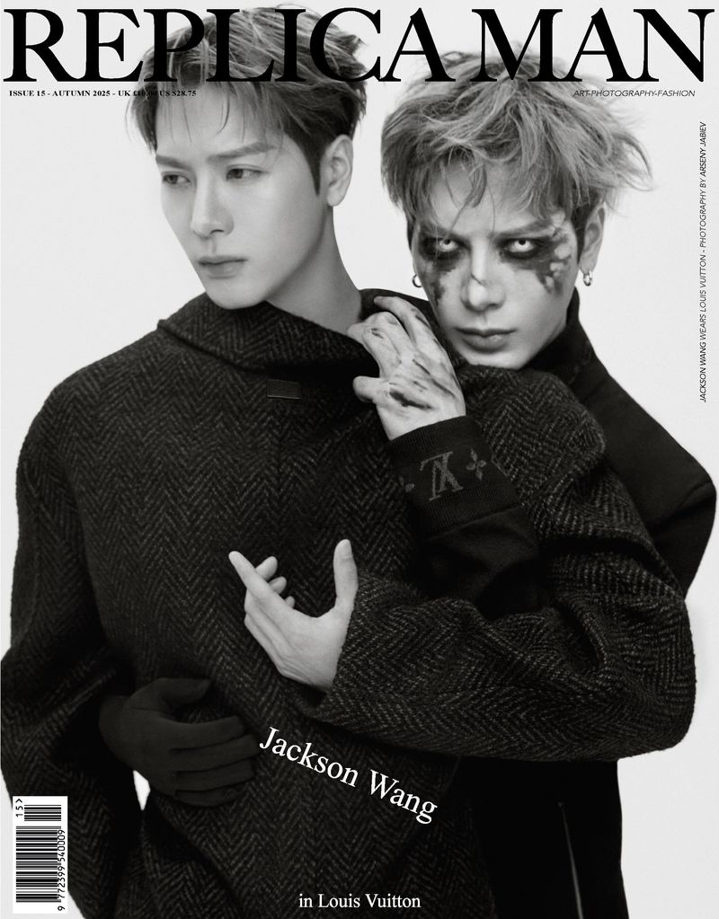 Replica Man magazine cover featuring Jackson Wang in Louis Vuitton clothing, with an adult male with face paint in black and white.