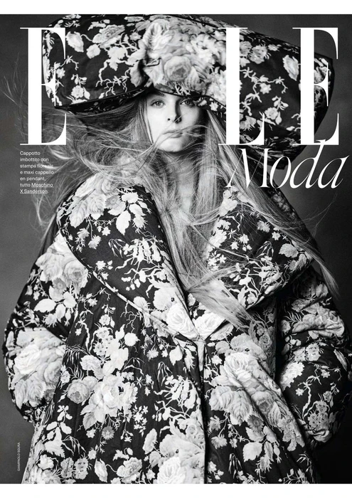 Model Aylah Peterson in a black and white floral padded coat and oversized hat for Elle Italia