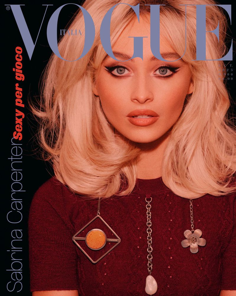 Sabrina Carpenter cover for Vogue Italia. Close-up of a woman with blonde hair and dark eye makeup wearing a maroon knit shirt.