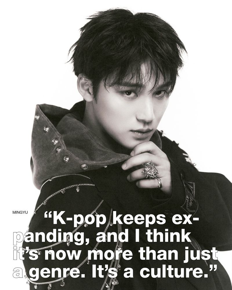 Monochrome portrait of a young Asian man in a hooded jacket with decorative embellishments, jewelry, and a quote about K-Pop culture.