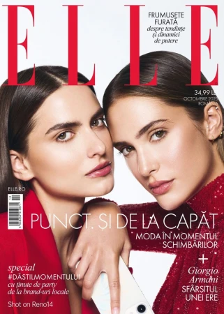 Close-up of the Elle Romania magazine cover featuring two young adult women with dark hair, red outfits, and neutral expressions.