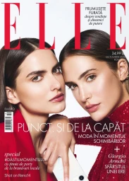Close-up cover portrait of two women posing together for Elle magazine against a white background, photographed by Stefan Dani.