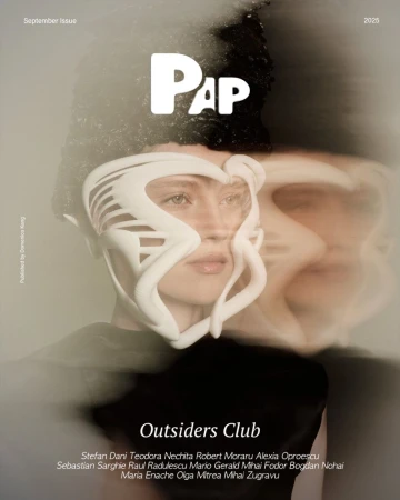 Magazine cover featuring a woman wearing a mask with superimposed ghostly face, in muted tones of grey and white with graphic PAP logo.