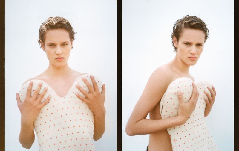 Woman poses in two close-up photos with a sweater; left photo shows her holding it to her chest and right photo shows it over shoulder.