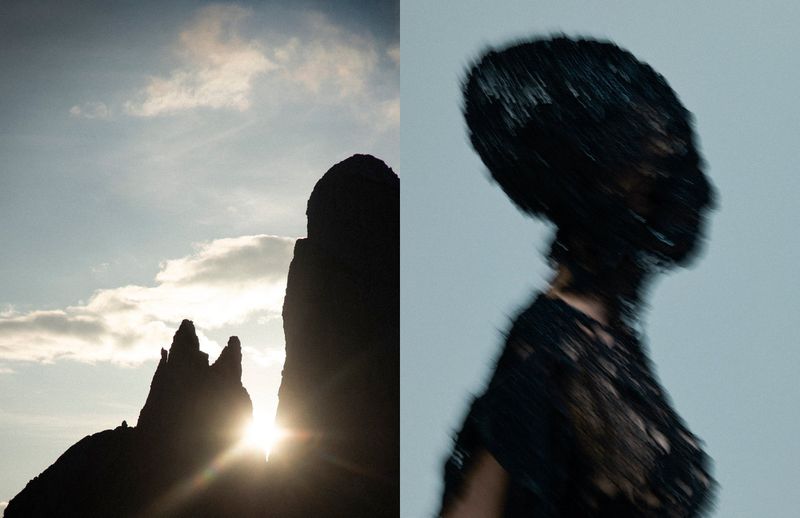Abstract visual split between sunlit rock formations against sky and a blurred female bust wearing dark textured clothing.