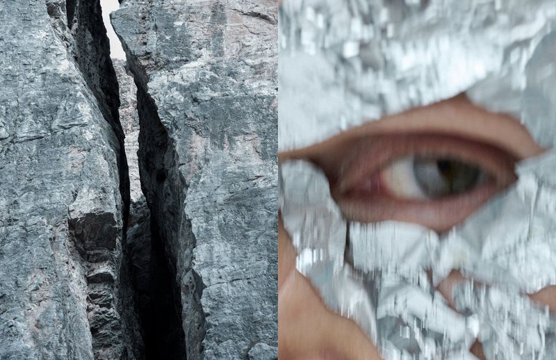 A composite image featuring a rugged mountain face and a person's eye peering through torn silver foil. The mountain has a deep crevice.