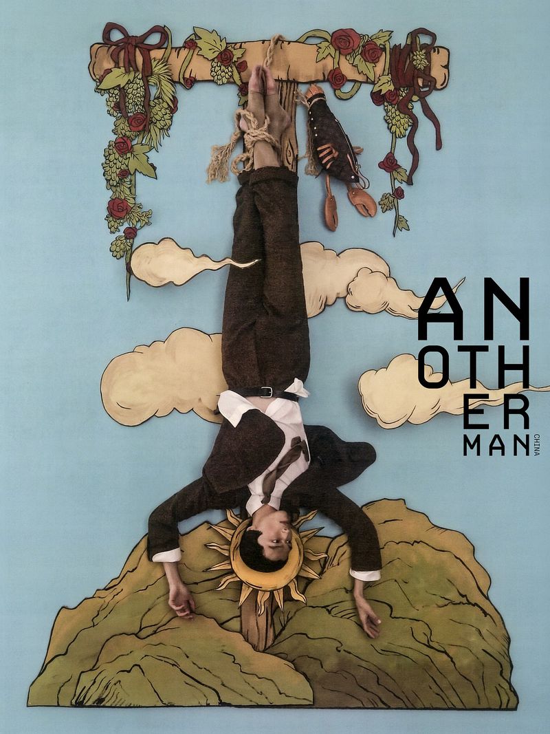 Illustration of a man hanging upside down in a suit from a wooden structure with floral and mountain elements against a blue background.
