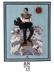 Fashion collage styled as a tarot card featuring an East Asian male model standing over illustrated ocean waves.
