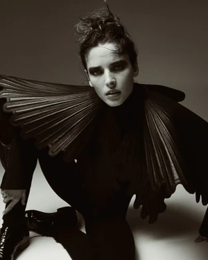 Model Libby Taverner in a structured black garment for Harper's Bazaar France, photographed by Drew Vickers.