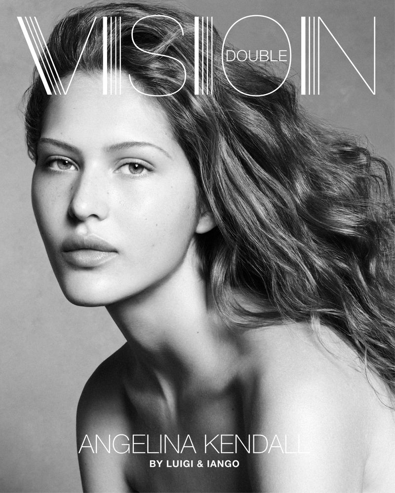 Black and white portrait of Angelina Kendall, face framed by wavy hair, shot by Luigi and Iango, for 'Vision Double' magazine cover.