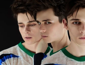 Multiple overlapping portraits of Ashby Gentry wearing a white lace patterned top with green trim against a black background
