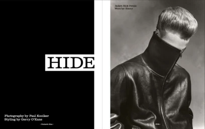 Black and white editorial spread showing a man in a high-collar black leather jacket zipped over his face next to text reading HIDE.