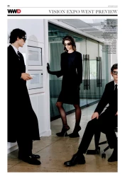 Fashion models wearing tailored black clothing and dark sunglasses in a modern corporate office interior for WWD.
