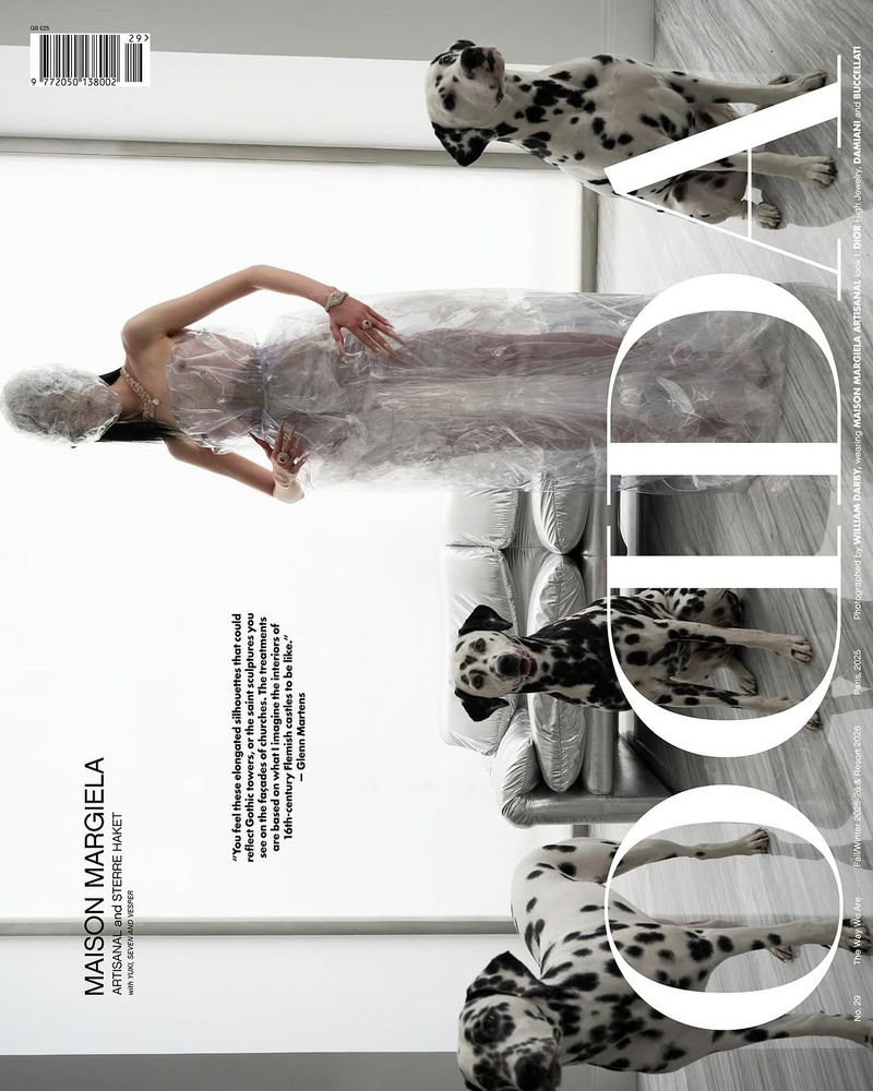 Editorial fashion shot of a woman covered in clear plastic wrap sitting on a couch with Dalmatian dogs, white background, bright lighting.