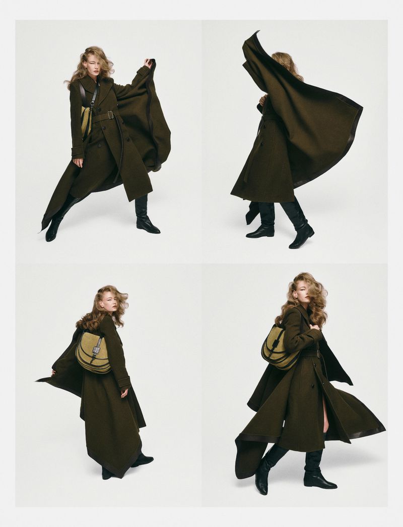 A fashion shot presents a woman with long wavy hair in a long trench coat, leather shoulder bag, and leather boots, against a white backdrop.
