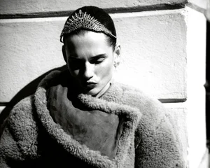 Model Giedre Dukauskaite wearing a jeweled tiara and fuzzy coat for Harper's Bazaar Espana