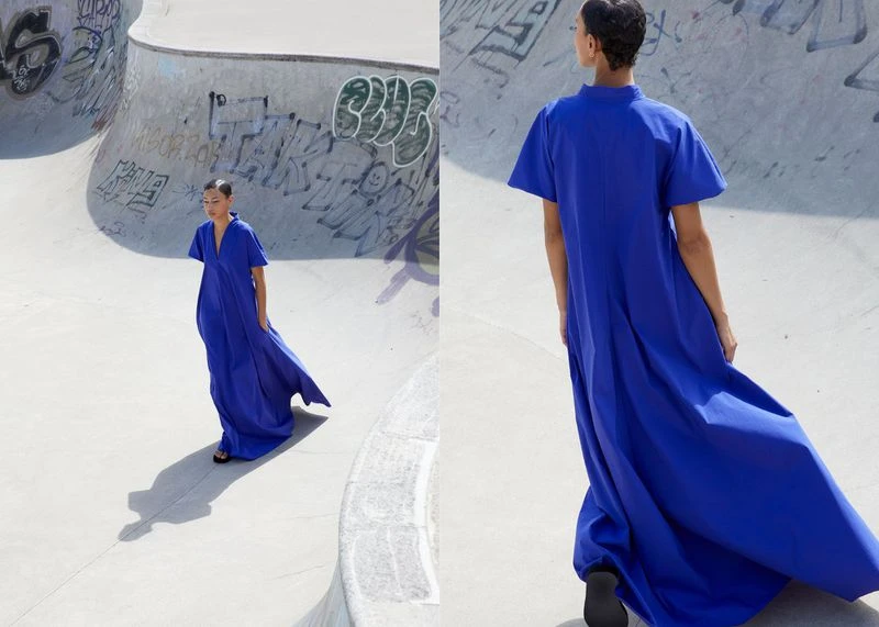 Two images of a young woman in a blue dress posing in an outdoor skatepark with graffiti, showcasing fashion and urban style.
