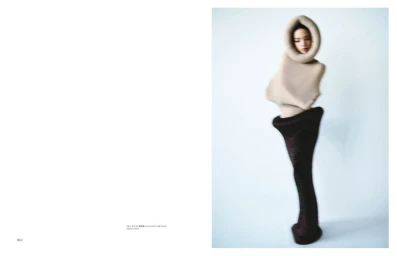Japanese actress Nana Komatsu in avant-garde sculptural garments against a white seamless background