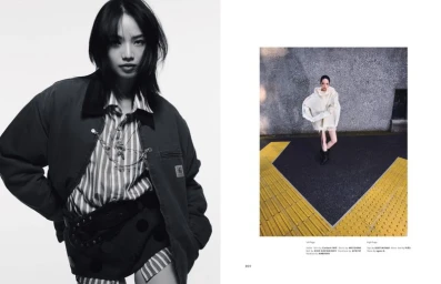 Nana Komatsu wearing a dark jacket over a striped shirt against a white backdrop, with a smaller inset street photograph on the right
