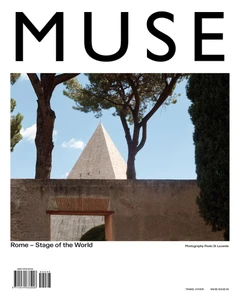 Muse Magazine cover featuring the Pyramid of Cestius in Rome framed behind a stone wall and Mediterranean trees under a blue sky.