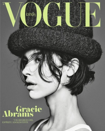 Vogue España cover featuring model Gracie Abrams wearing a knit hat, shot in black and white with the magazine's masthead visible.