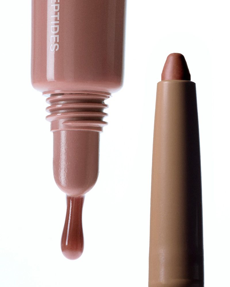 Cosmetic product shot featuring a tube with a drop and lip pencil in neutral tones, set against a bright white background.
