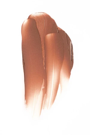 Close-up still life product shot of a glossy brown lipstick or lip tint swatch against a clean white background.