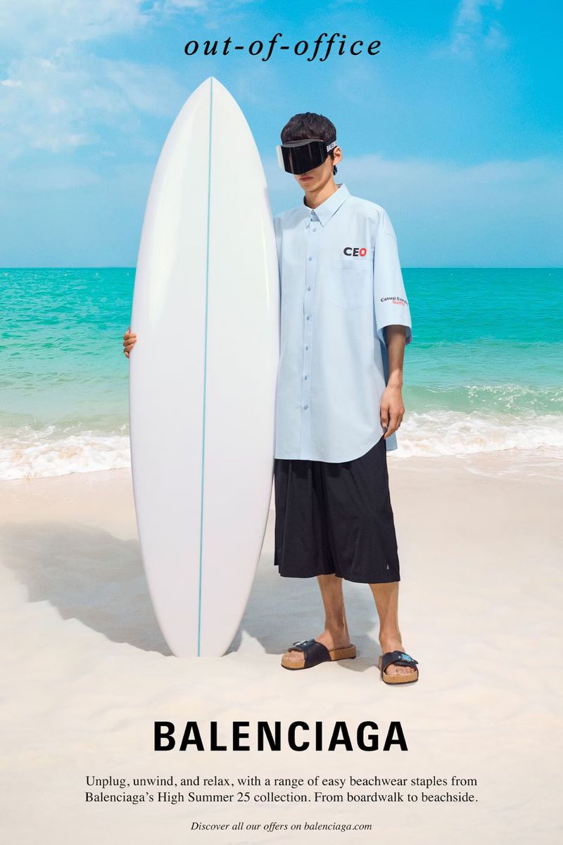Balenciaga fashion advert featuring a man holding a surfboard on a beach with 'out-of-office' text, promoting beachwear from the High Summer collection.